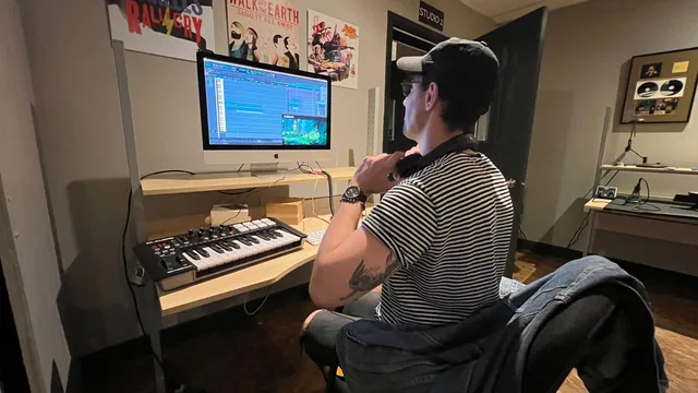 person exploring career paths in livestreaming with laptop camera and microphone